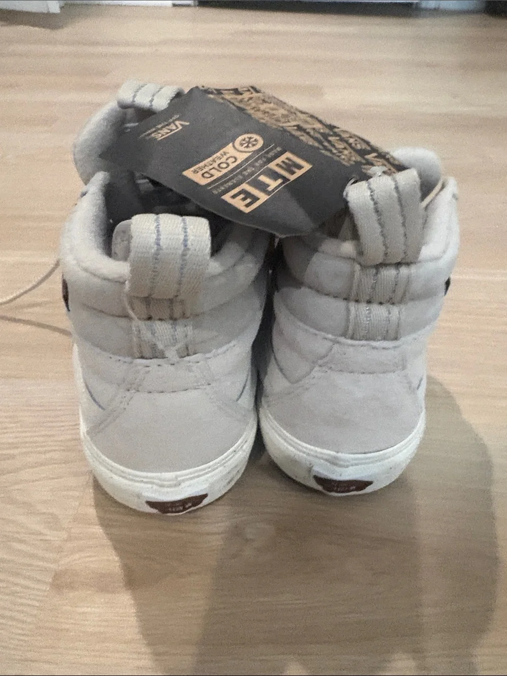 Vans women’s8.5/mens 7 High-Top Suede Sneakers in Light Gray and White